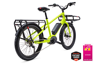 A lime green electric bike with a basket by Benno Bikes.