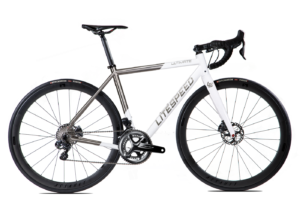 A white Colnago bike against a black background.