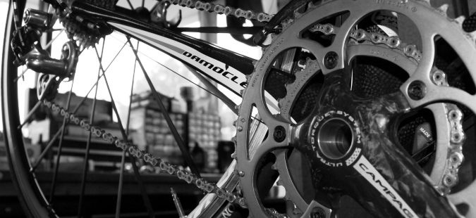 A black and white photo of a bicycle chain.